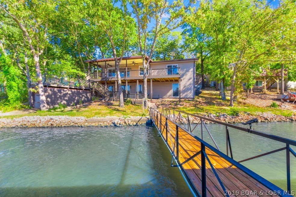 39 Maid Marian Ct, Roach, MO 65787 - photo 1