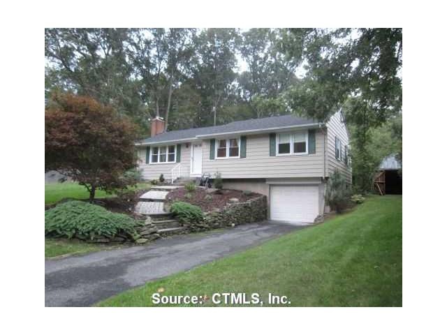 Exterior Front. Nicely landscaped walkway leads to