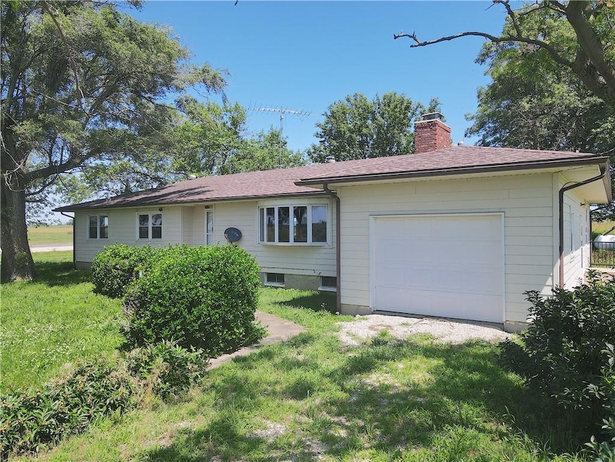 View of front of home featuring a garage