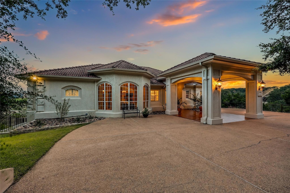 Back of property featuring stucco siding, a patio