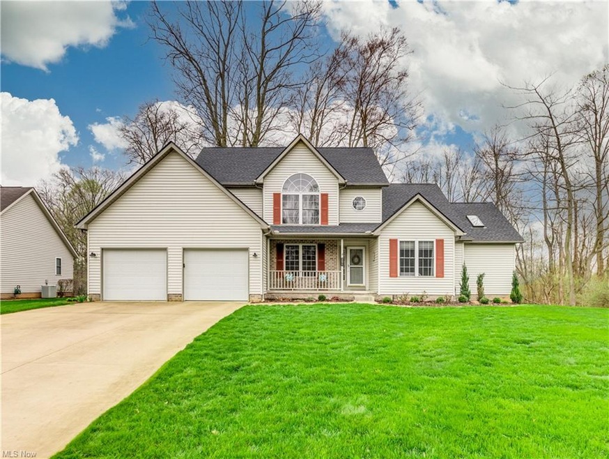 Take a look at this beautiful home located in a very private wooded lot.