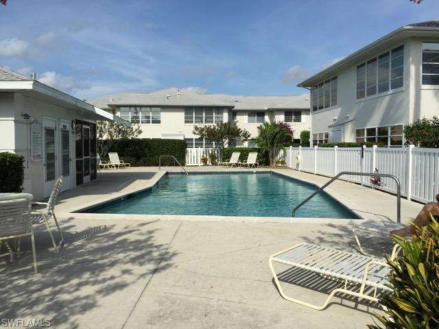 701 Neapolitan Way, Naples, FL 34103 - photo 1