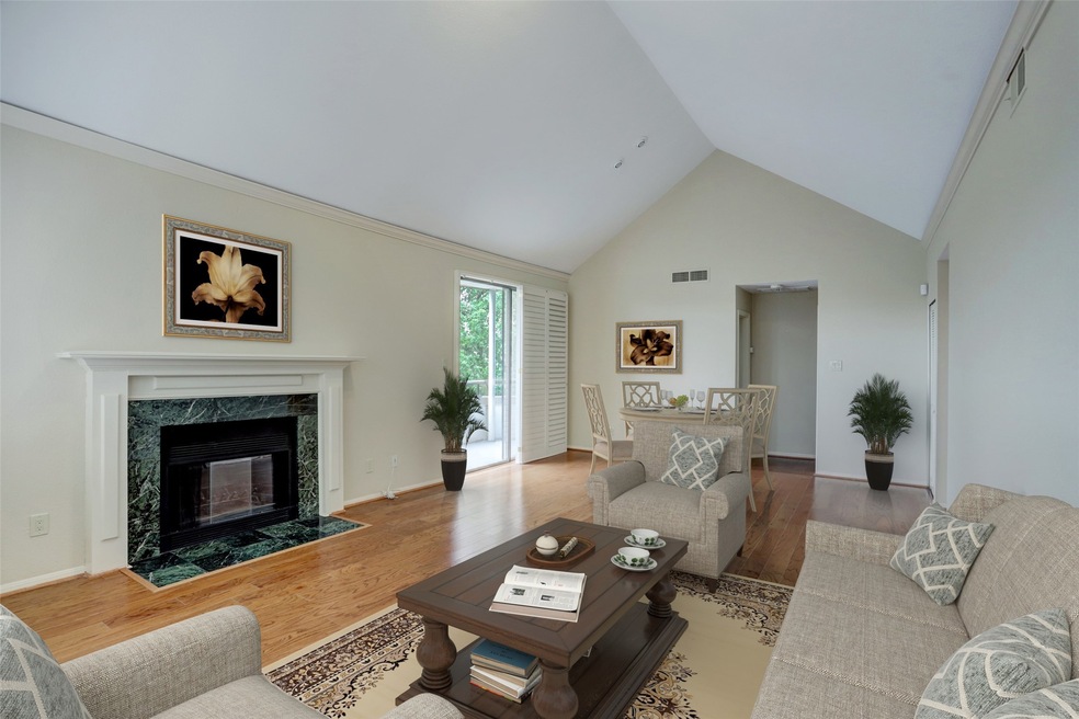 Gorgeous light filled living/dining room with vaul