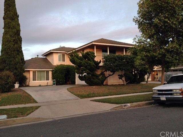 House front with upstairs balcony off the bonus ro