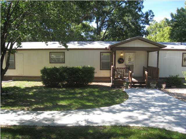 View of Front Covered Deck and Sidewalk