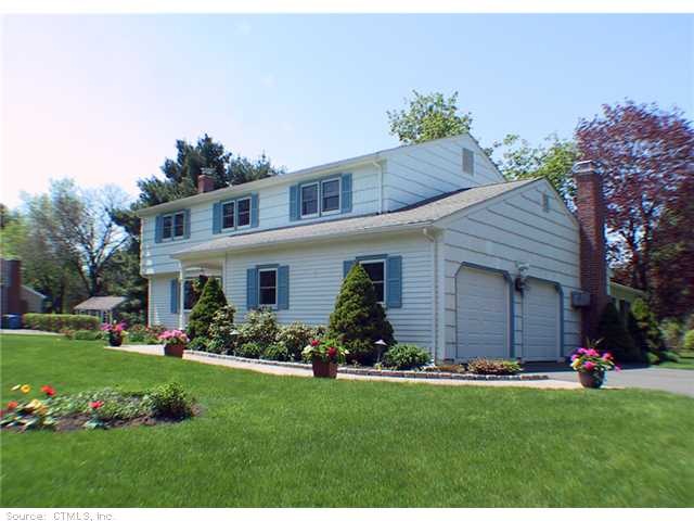 Exterior Front. Professionally landscaped, lovely 