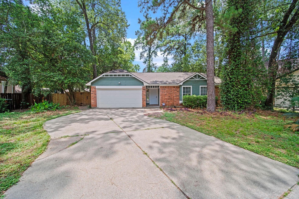 39 N Rain Forest Ct, Spring, TX 77380 - photo 1