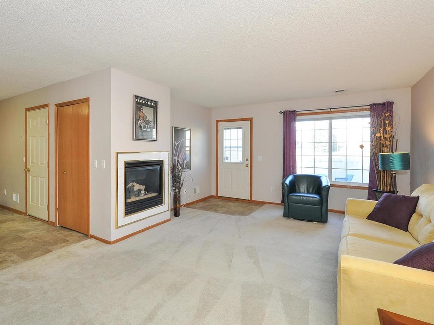 Spacious living room opens up to kitchen