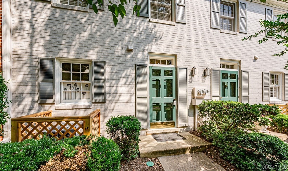 View of exterior entry featuring french doors