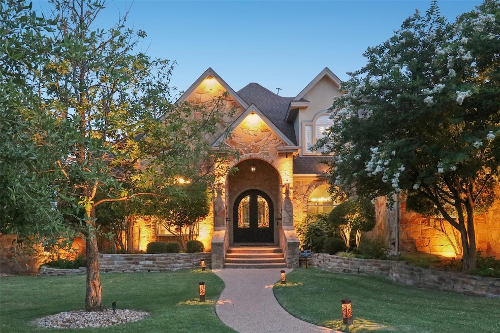 View of front of house featuring stone siding and