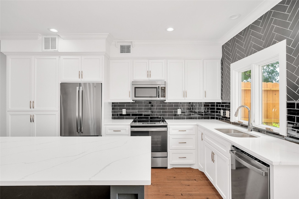 Totally renovated kitchen with newer quartz counte