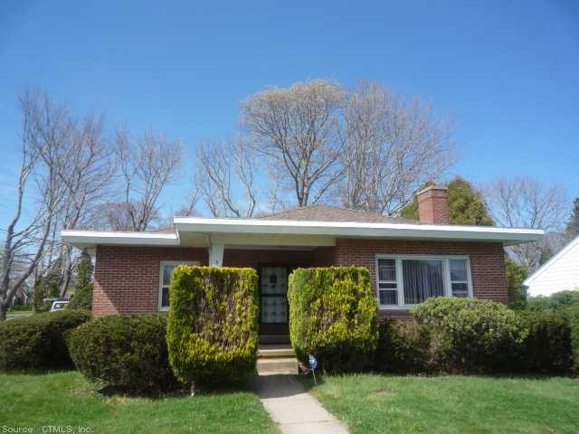 Exterior Front. Charming brick ranch located on a 