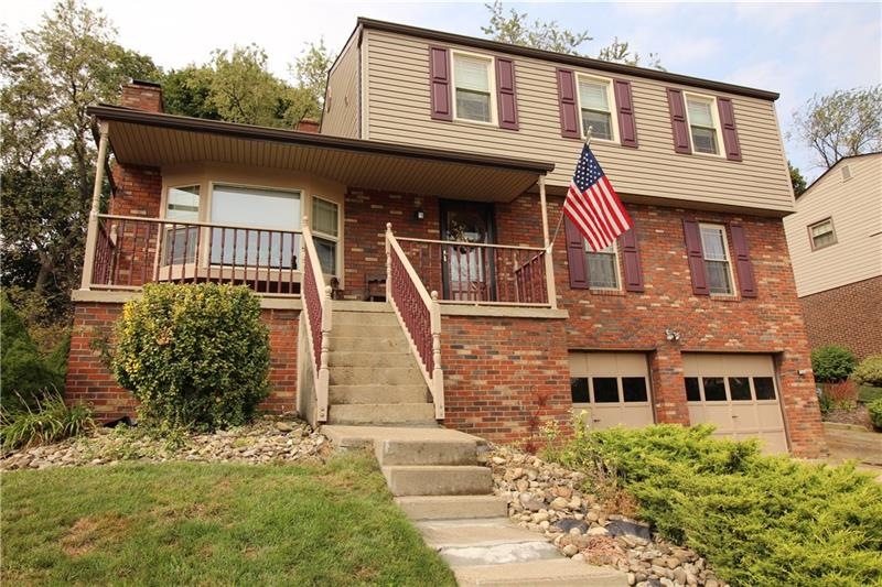 SPACIOUS 3 Bedroom Brick w/ First Floor Family Roo