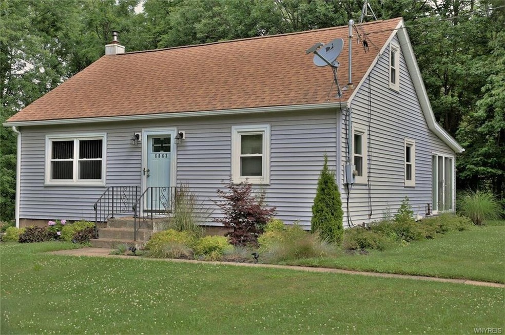 Front elevation-take note of updated siding, windo