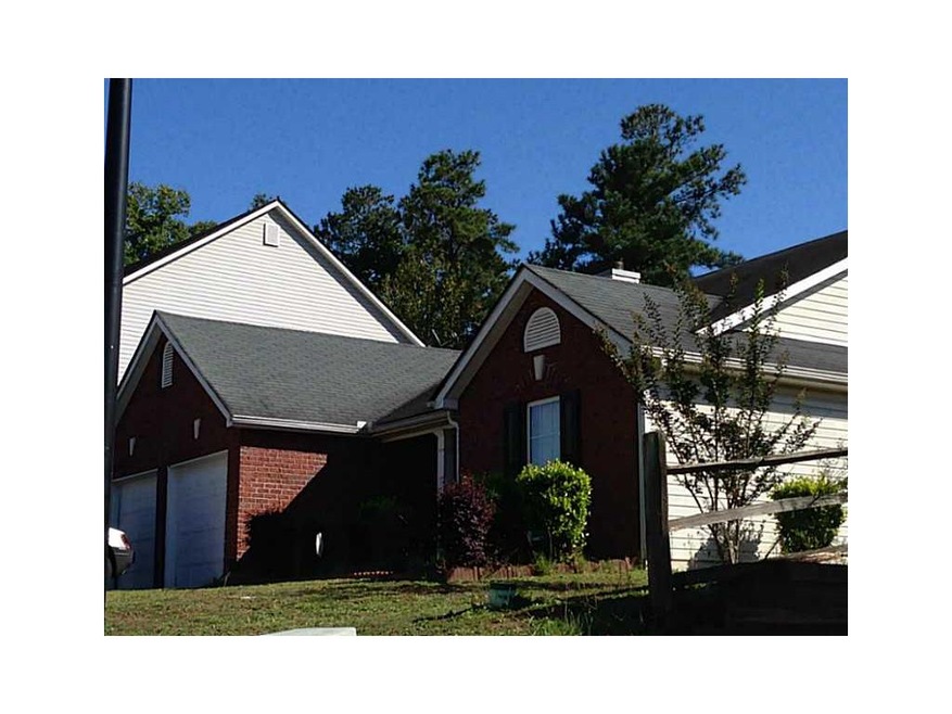 Exterior Front. 2 car garage w/ more parking