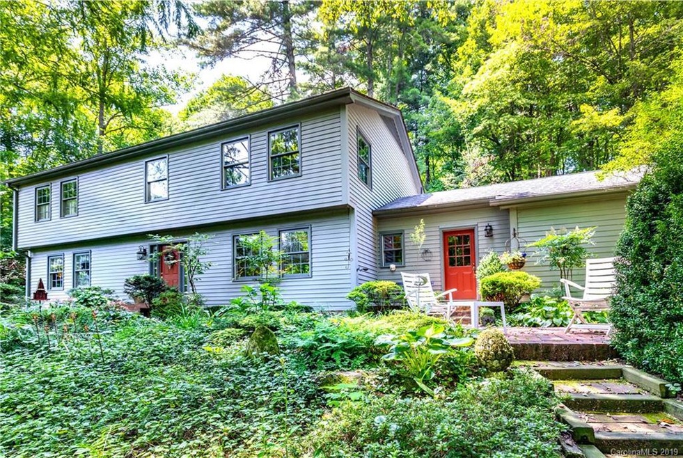 Colonial New England Salt Box style home in a beautiful setting