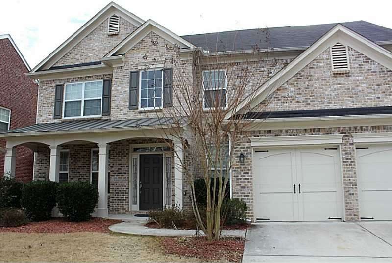 Exterior Front. Beautiful Suwanee home with 3 side
