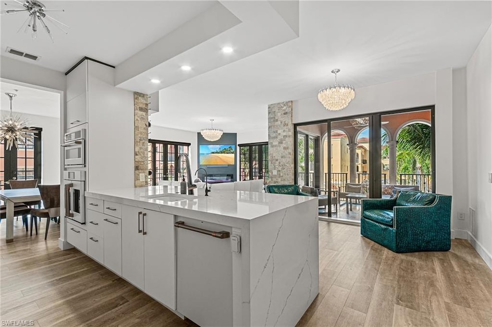 Kitchen featuring visible vents, light wood-style 