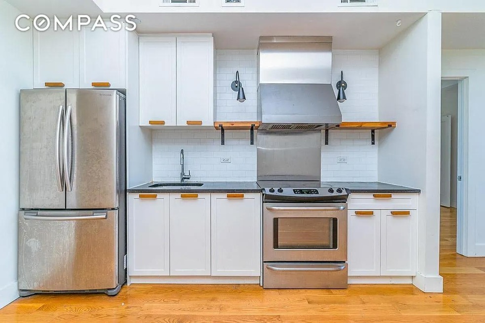 55-27 Myrtle Ave unit 304, Ridgewood, NY 11385 - photo 1