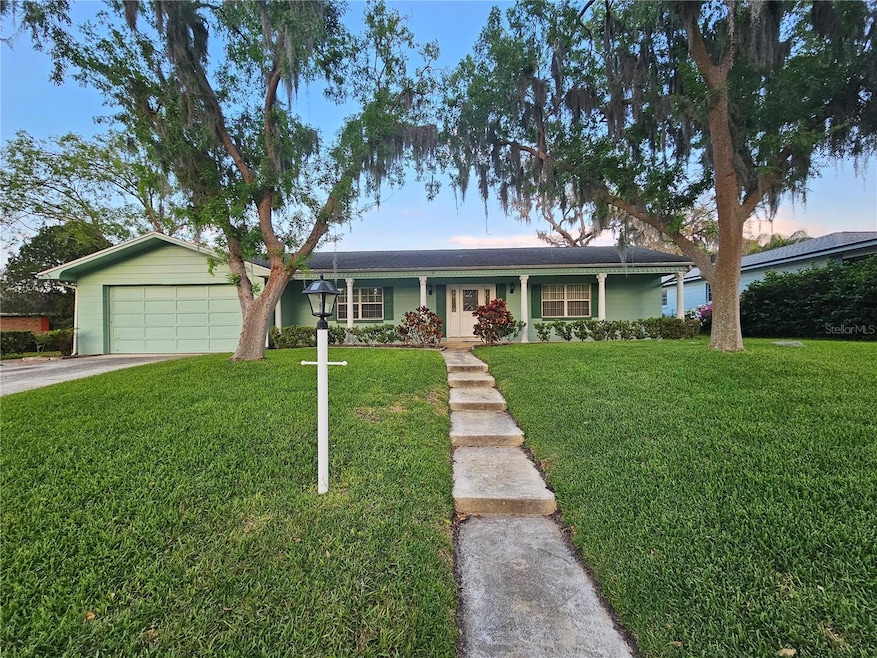 Exterior Home. Beautiful  tree lined road. The home is on the base of the cul-de-sac.
