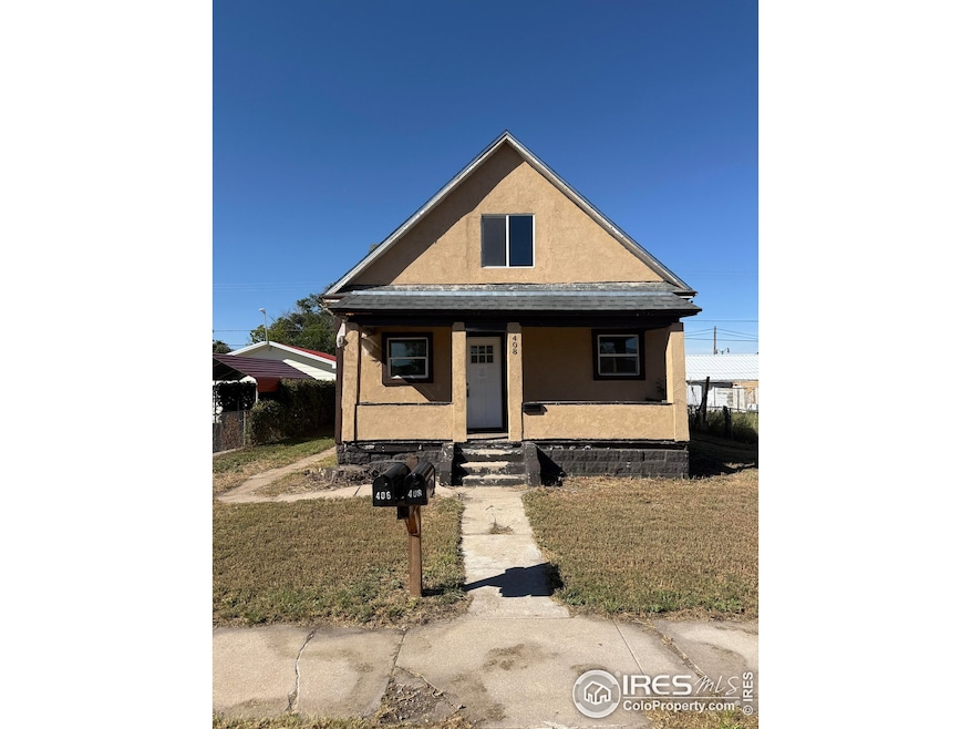 408 Douglas St, Sterling, CO 80751 - photo 1