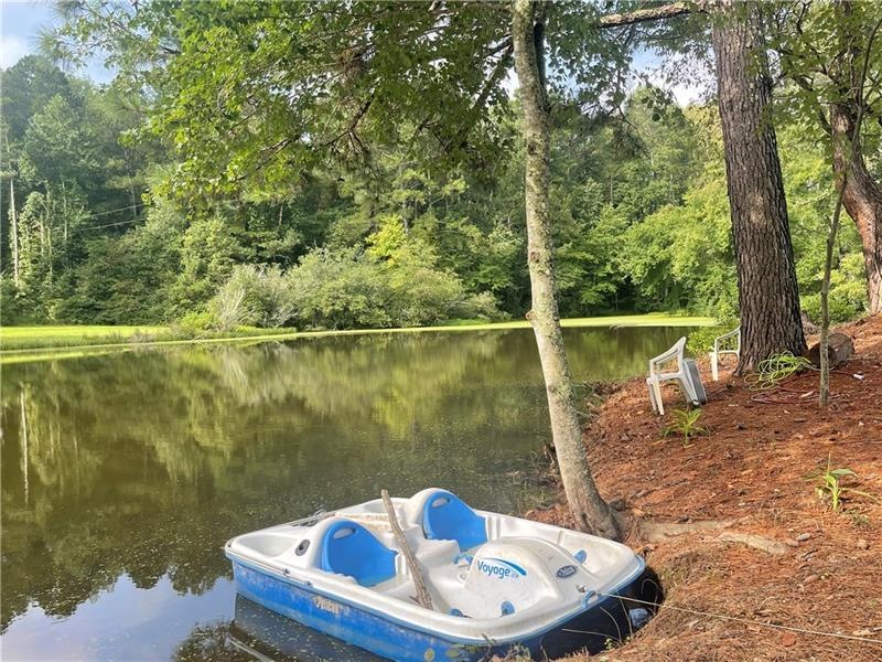 About 140 feet of lake frontage . Pond is 4 acres 