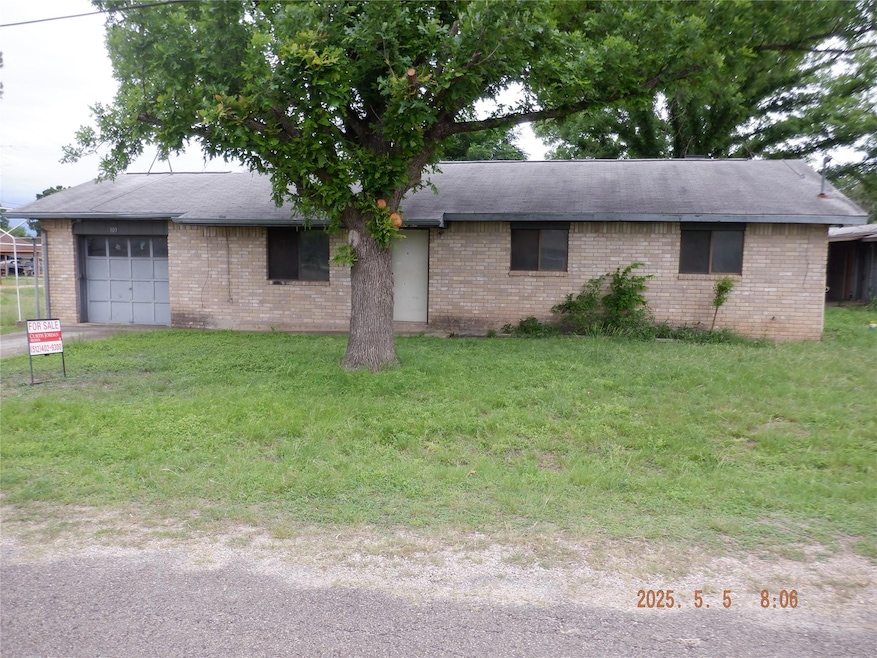 View of front of house featuring brick siding, ro