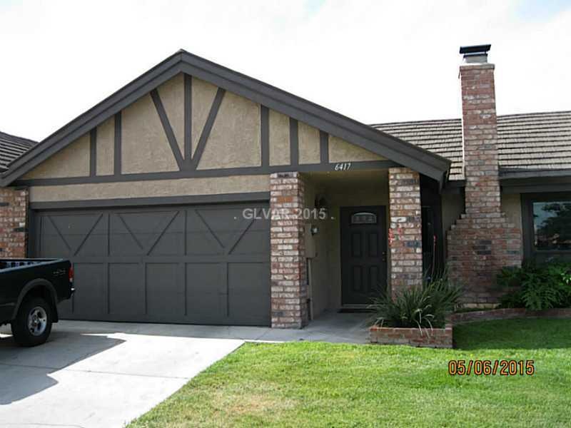 Facade/Exterior Front. Lots of green grass and ton
