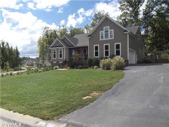 Exterior Front - Front view of home with large dri