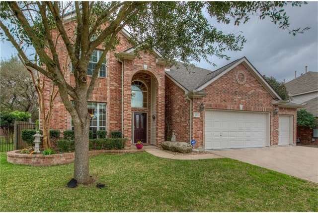 Great curb appeal. Manicured shrubs, bricked plant