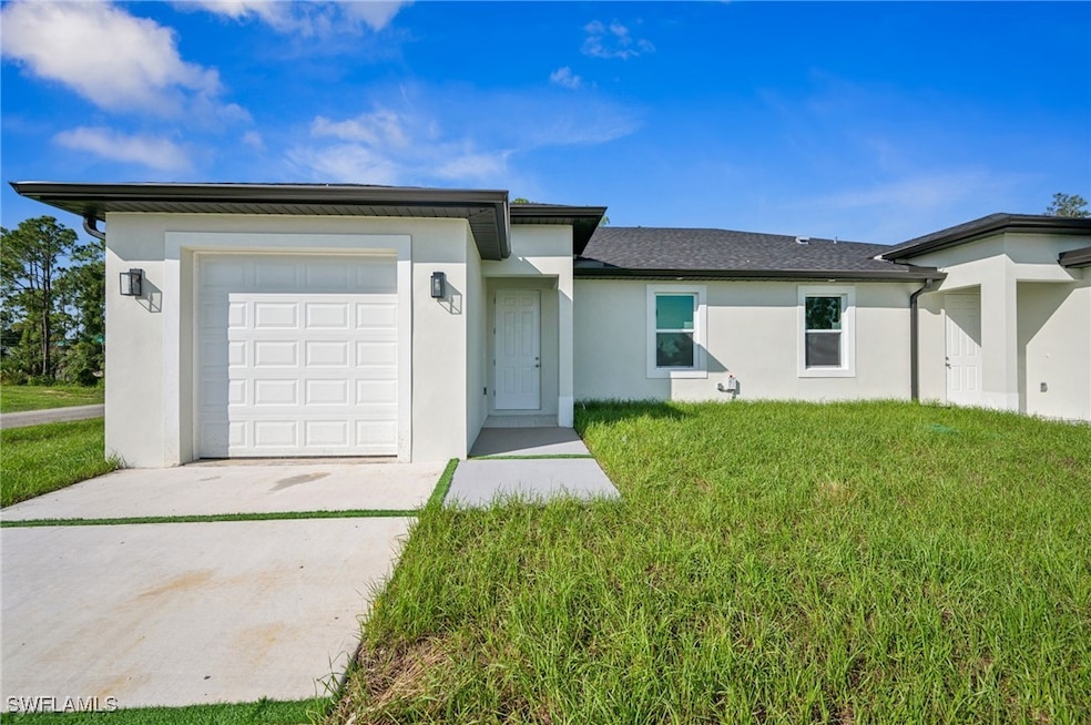 4701-4703 28th St SW, Lehigh Acres, FL 33973 - photo 1