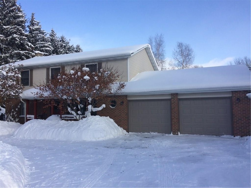 New insulated garage doors, covered front porch an