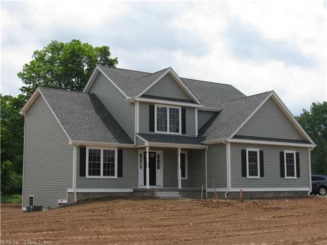 Exterior Front. Large level yard front and rear Hy