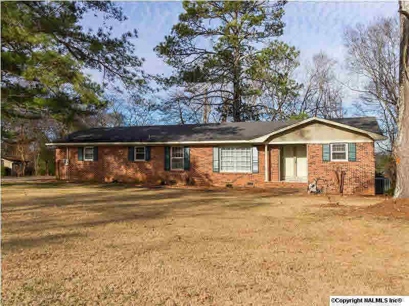 Situated on almost one acre just south of the Tennessee River, this home is a short drive to all of the conveniences of Huntsville. It is surrounded by lots of mature trees and beautiful mountain views.