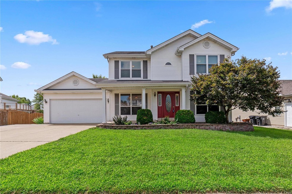 Fenced yard & extra wide driveway.