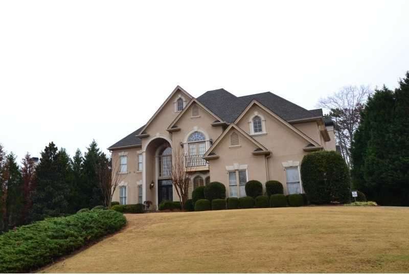 Exterior Front. Elegant executive home with 3 fini