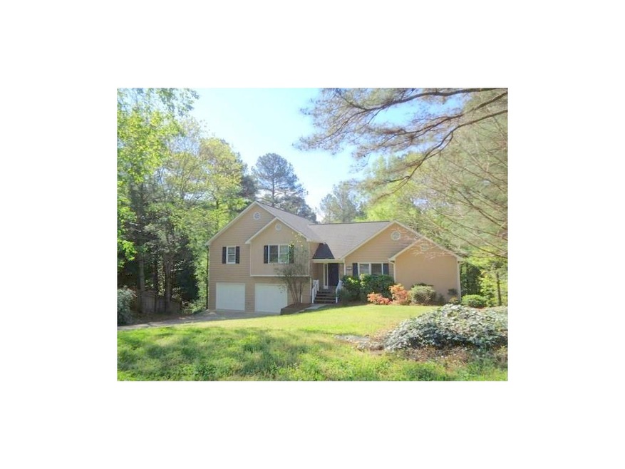 Pretty home on more than 1/2 acre that backs up to