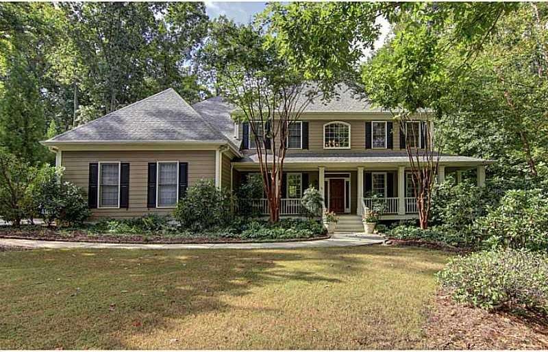 Exterior Front. Wooded lot. Huge backyard and fron
