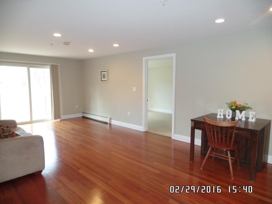 59 Ponemah Hill Rd unit 1-103, Milford, NH 03055 - photo 1