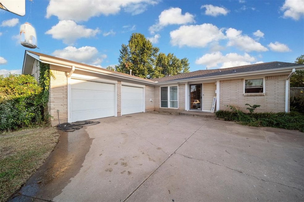Single story home featuring a garage
