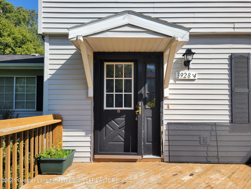 3928 Hunters Ridge Dr unit 4, Lansing, MI 48911 - photo 1