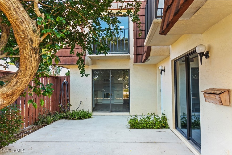 Property entrance with a patio