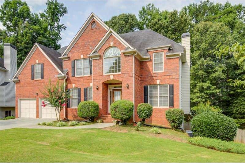 Brick front with hardiplank three sides.