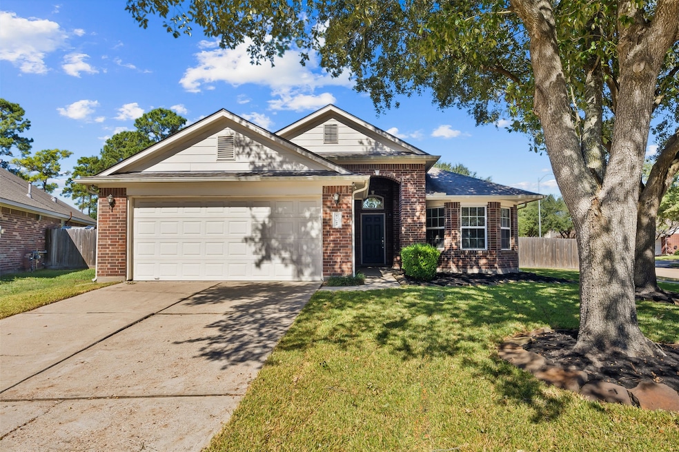 Welcome to Cypress Mill Park—this charming brick one-story sits on a spacious corner lot with mature trees, a two-car garage, and inviting curb appeal. A peaceful, well-kept setting in a highly sought-after community.