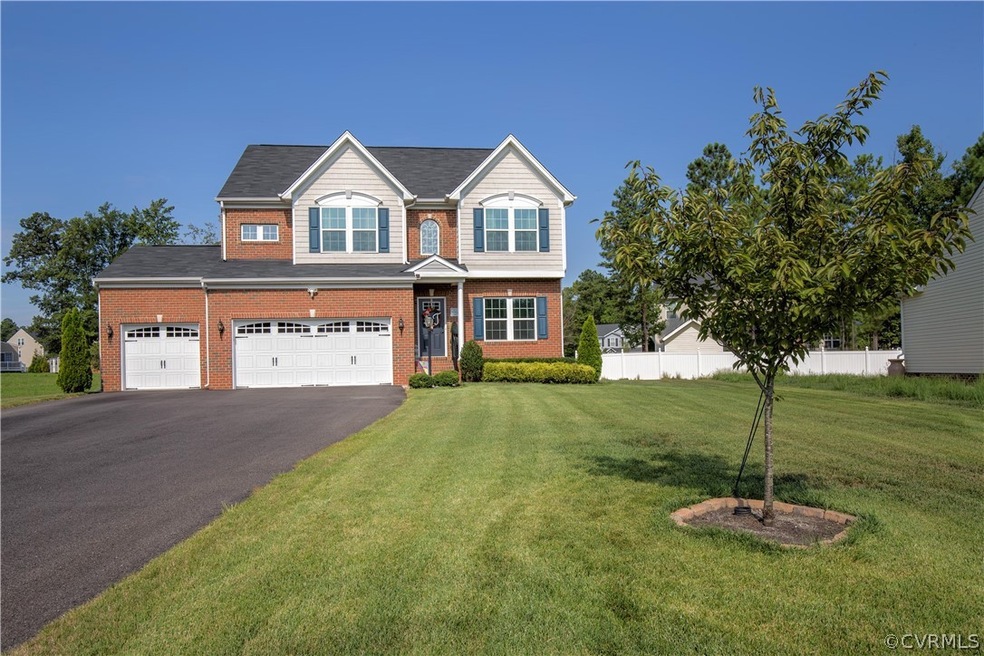 Welcome home!  This four bedroom/two-and-a-half ba