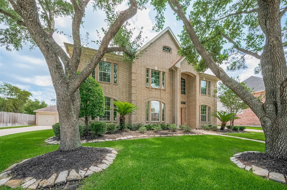 Welcome home to 24922 Falcon Hollow! Stunning curb