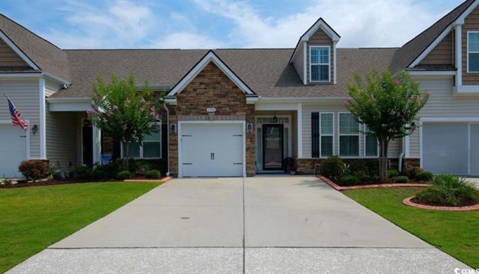 Craftsman-style house featuring a front lawn and a