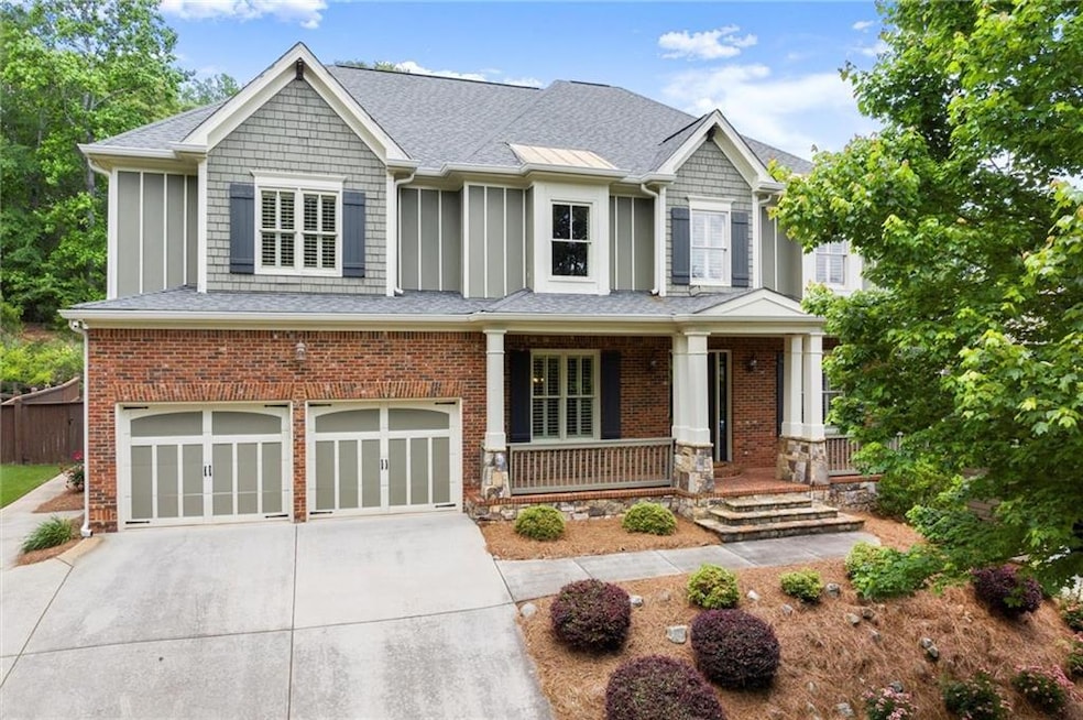 Showcasing this charming home in the heart of Waterside at Lanier Springs. Visit 1286whispercove.com/mls for more information.