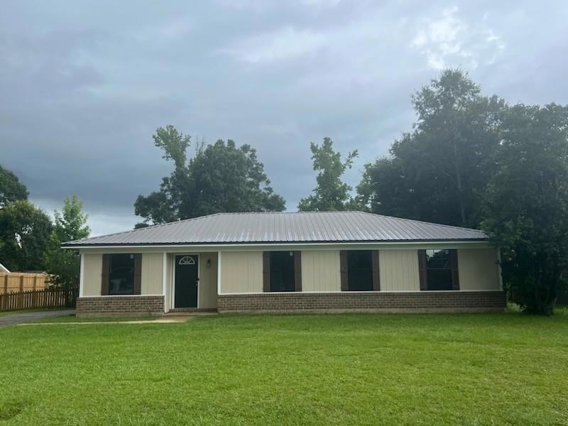 View of front of property with brick siding
