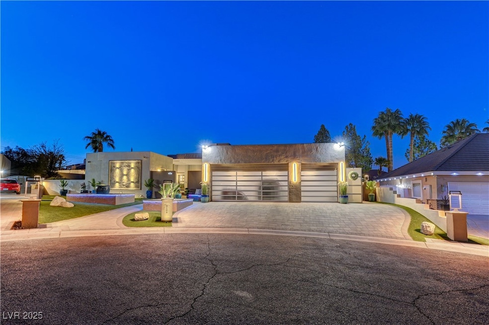 Twilight photo of beautiful modern custom home sit